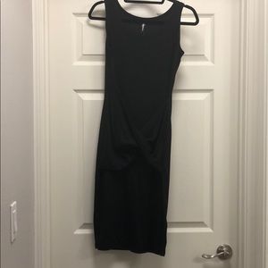Black sleeveless bodycon dress